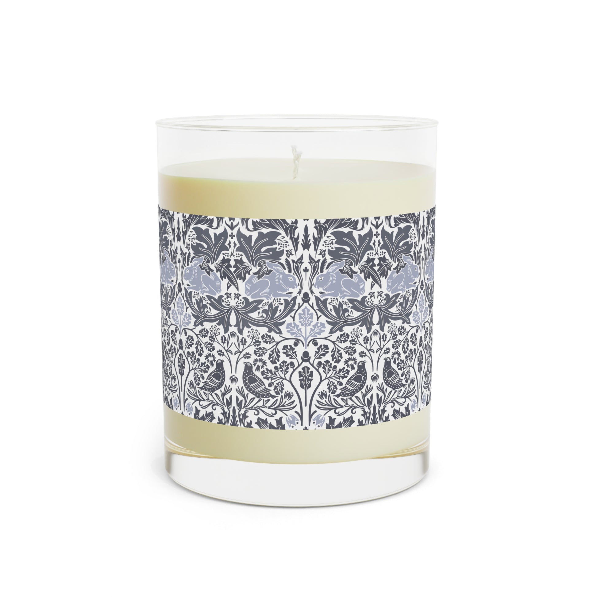 Candle with decorative label on a white background