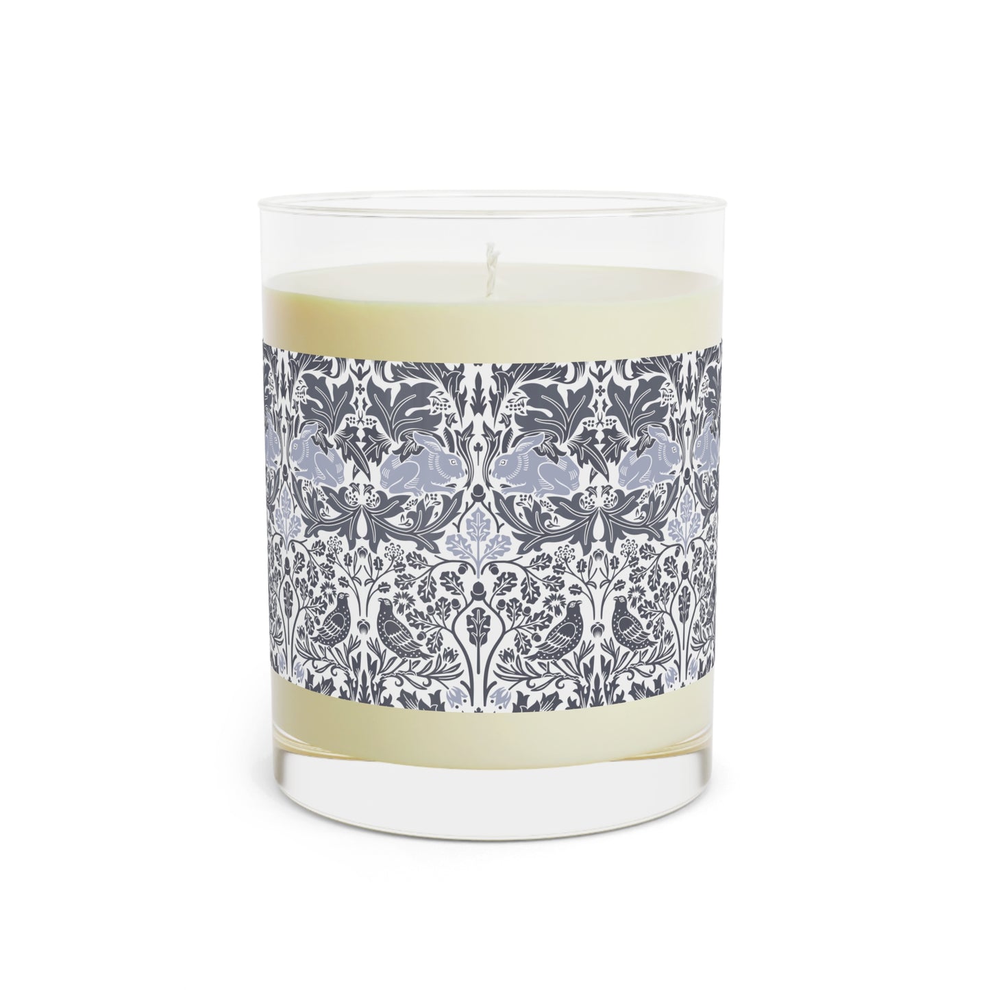 Candle with a decorative label on a white background
