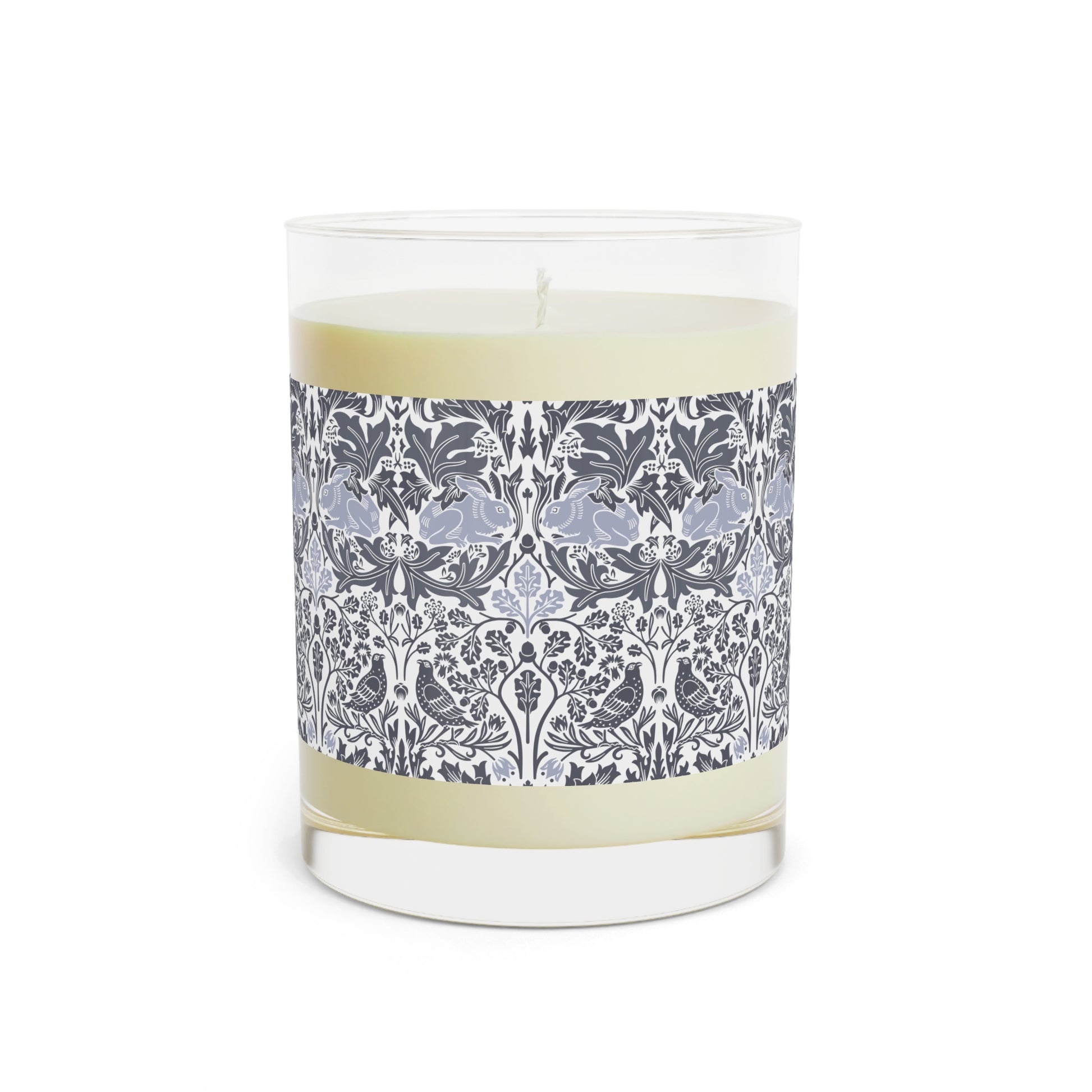 Candle with a decorative label on a white background
