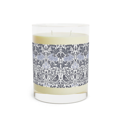 Candle with a decorative label on a white background
