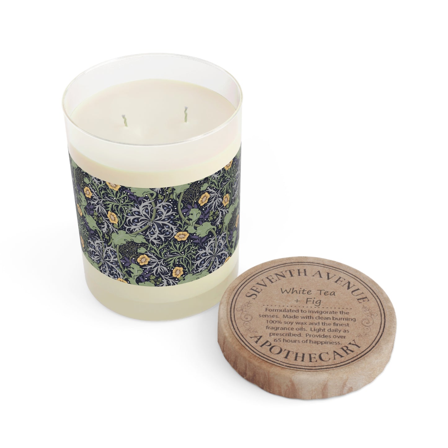 A luxury scented soy wax candle in a glass jar with a William Morris floral pattern wrapping around the glass jar, labeled 'Seaweed Collection (Yellow Flower)', alongside a vintage style cardboard lid.