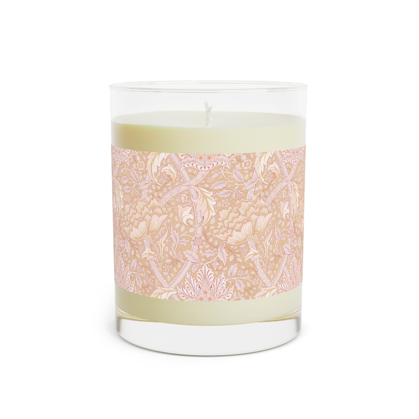 A luxury scented candle with a floral William Morris & Co pattern wrap around the glass jar, alongside a brown cardboard lid.