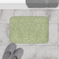 A rectangular green microfibre bath mat with a floral pattern inspired by William Morris - Acorns & Oak Leaves Collection.