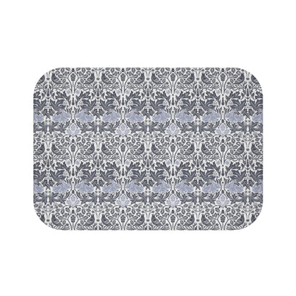 Microfibre bath mat with a gray and white floral pattern inspired by William Morris' work.