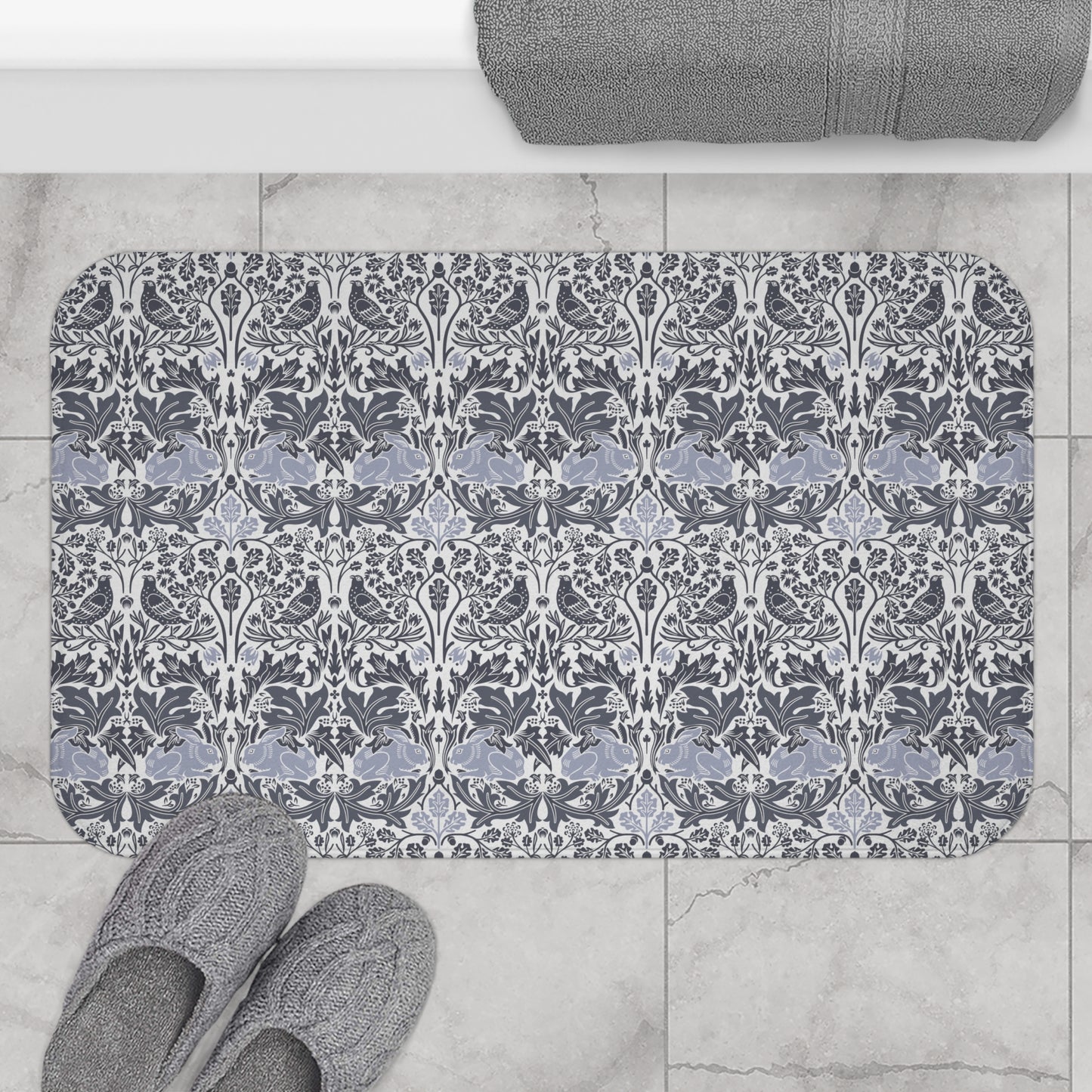 Microfibre bath mat with a gray and white floral pattern inspired by William Morris' work.