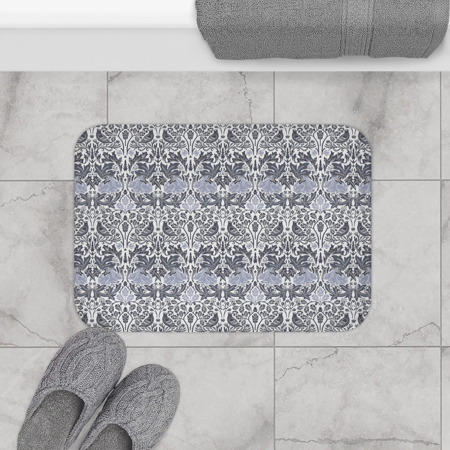 Microfibre bath mat with a gray and white floral pattern inspired by William Morris' work.