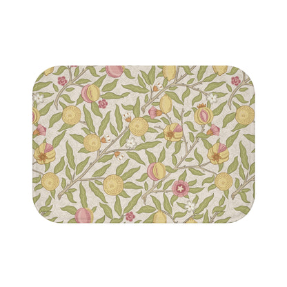 Floral patterned mat with green leaves and yellow flowers on a beige background