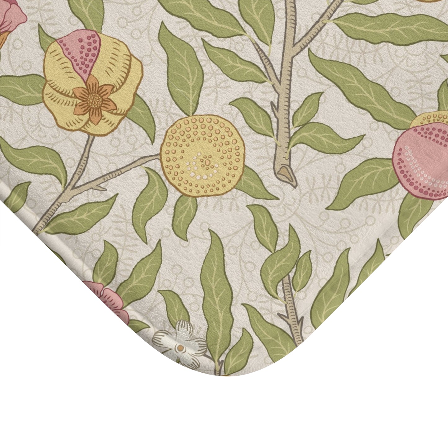 Fabric with a floral pattern featuring green leaves and pink flowers on a beige background