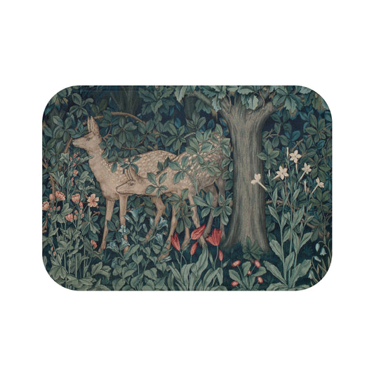 A microfibre bath mat featuring an intricate design of a deer in a forest setting, inspired by the William Morris tapestry.