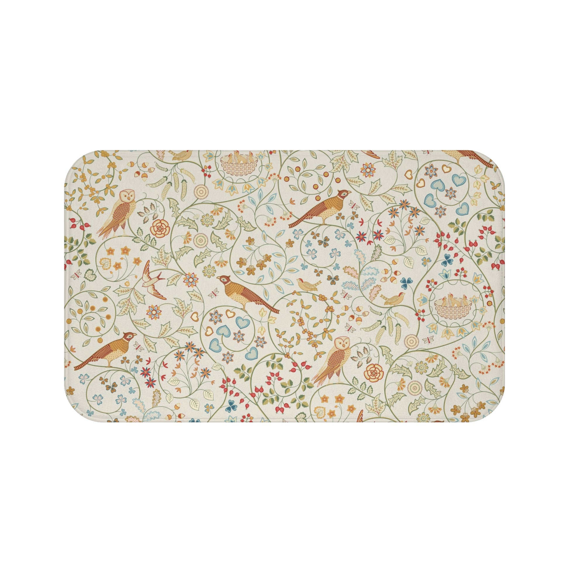 A microfibre bath mat with a floral and bird pattern inspired by William Morris, in a beige, green, and brown color palette.