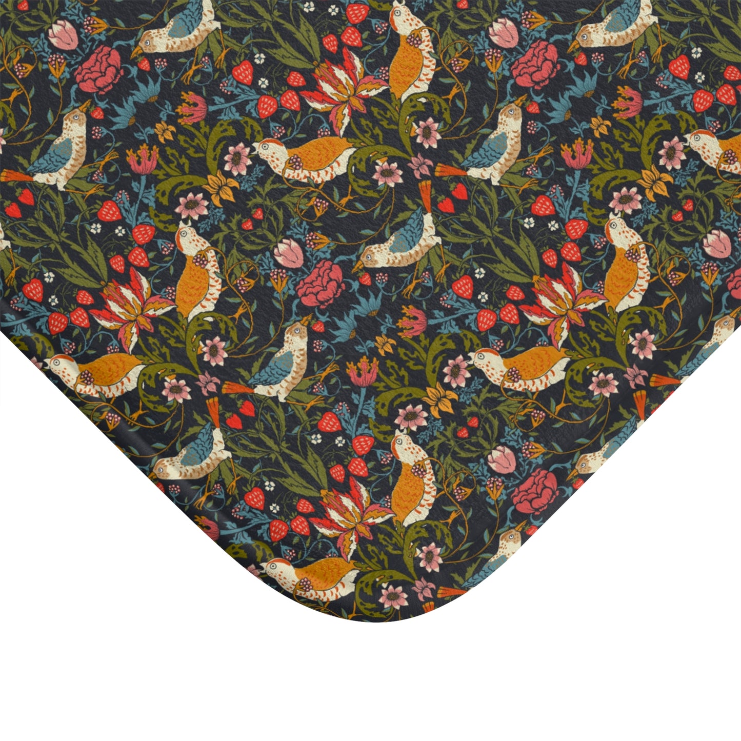 Patterned fabric with birds and flowers on a dark background