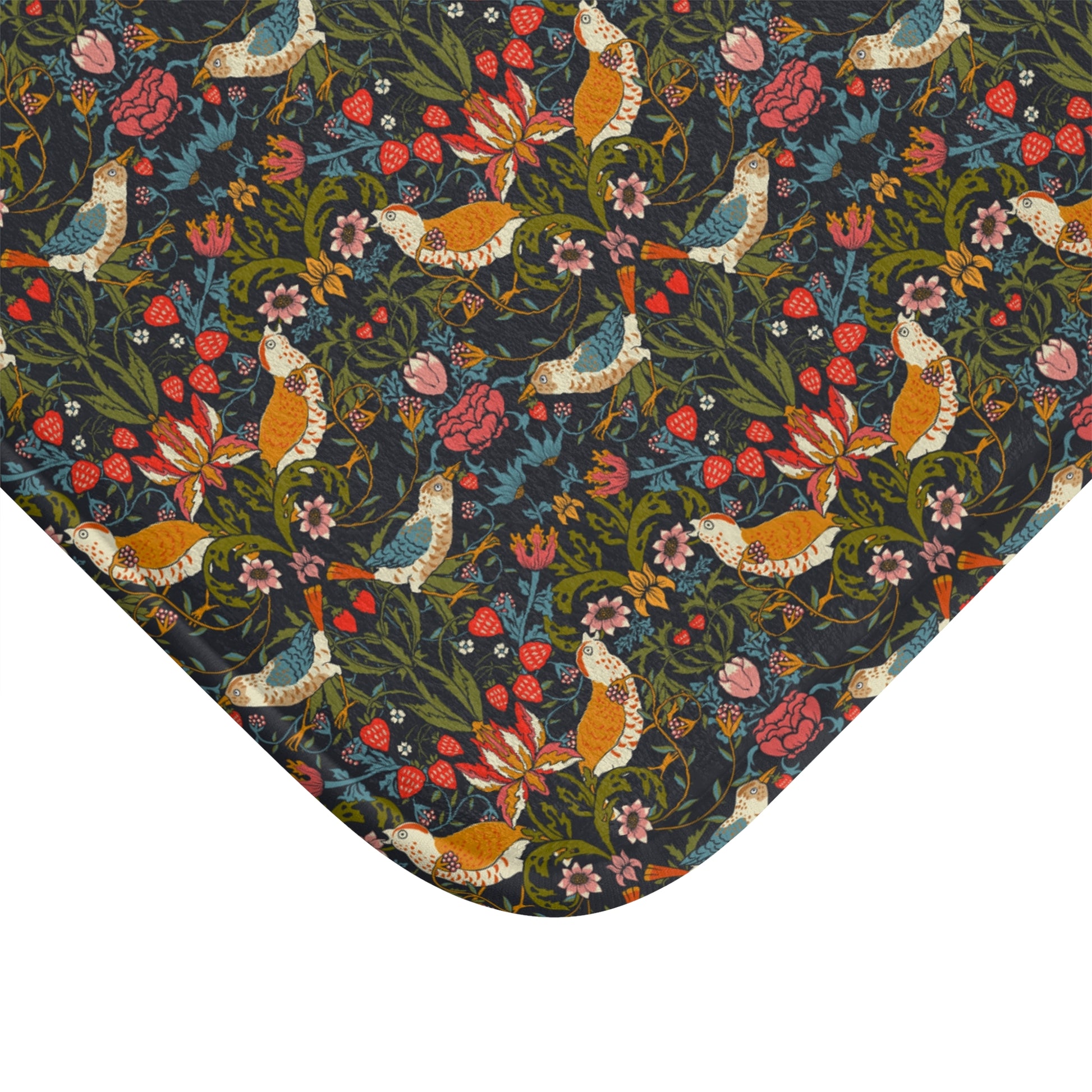 Patterned fabric with birds and flowers on a dark background