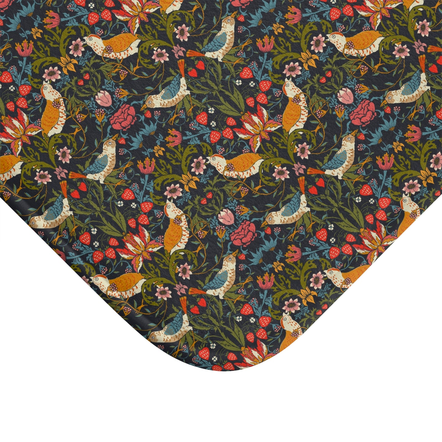 Patterned fabric with birds and flowers on a dark background