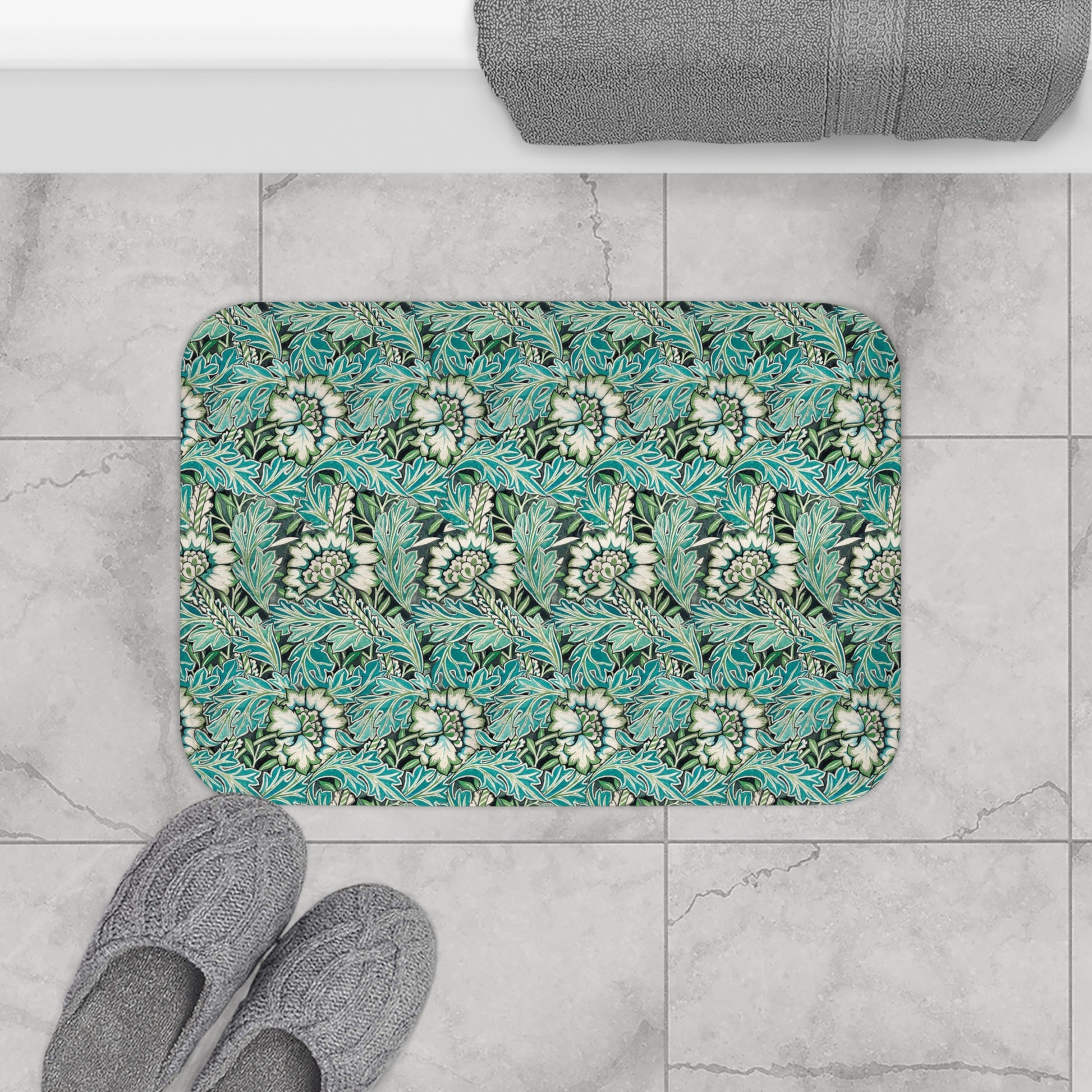 Microfibre bath mat with a floral pattern inspired by William Morris, predominantly in blue and white colours.