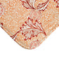 Rectangular microfibre bath mat with an orange and white floral pattern inspired by William Morris' Apple Collection.