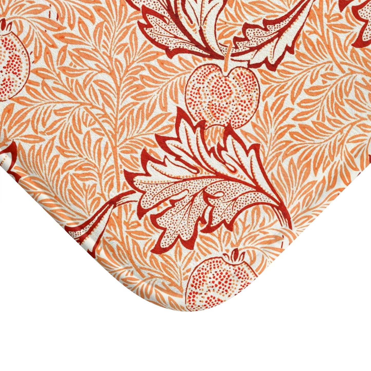 Rectangular microfibre bath mat with an orange and white floral pattern inspired by William Morris' Apple Collection.