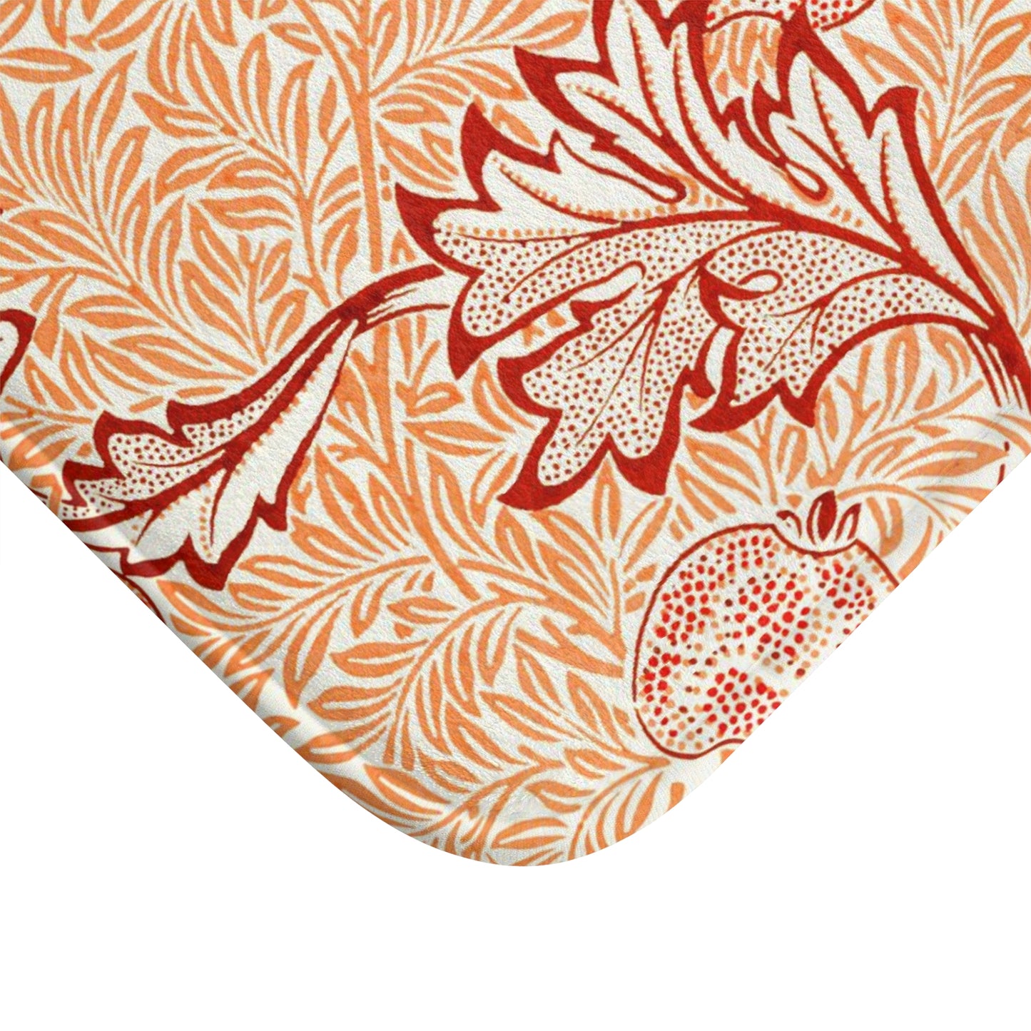 Rectangular microfibre bath mat with an orange and white floral pattern inspired by William Morris' Apple Collection.