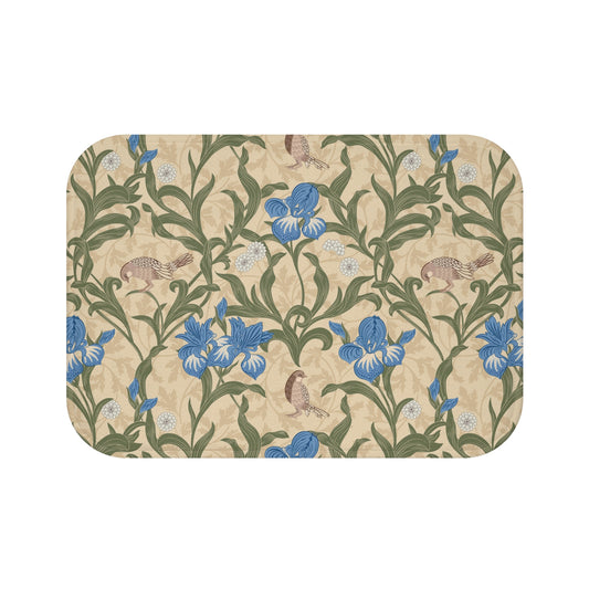 Microfibre bath mat with a floral pattern inspired by William Morris, predominantly blue irises on a beige background.