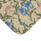 Microfibre bath mat with a floral pattern inspired by William Morris, predominantly blue irises on a beige background.