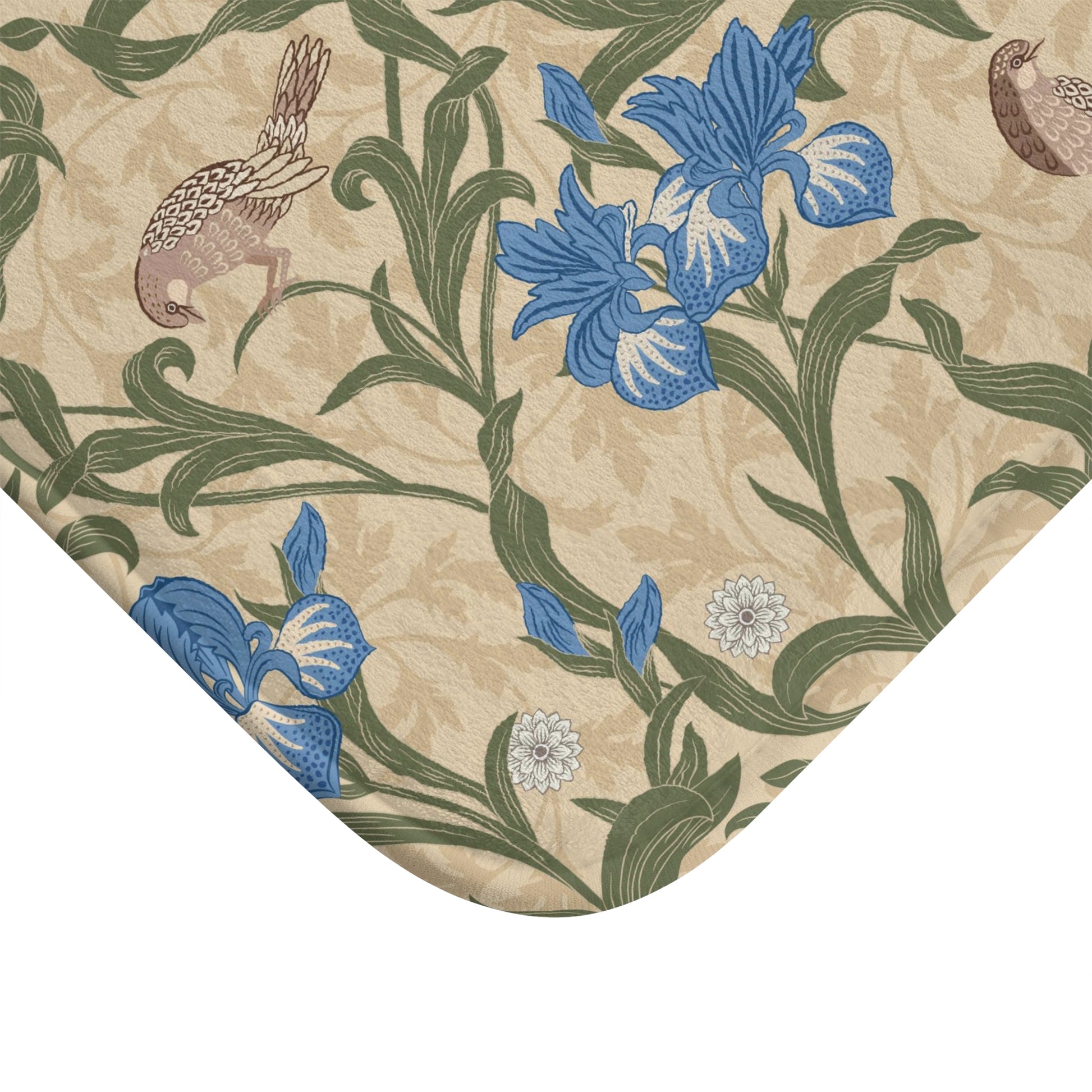 Microfibre bath mat with a floral pattern inspired by William Morris, predominantly blue irises on a beige background.