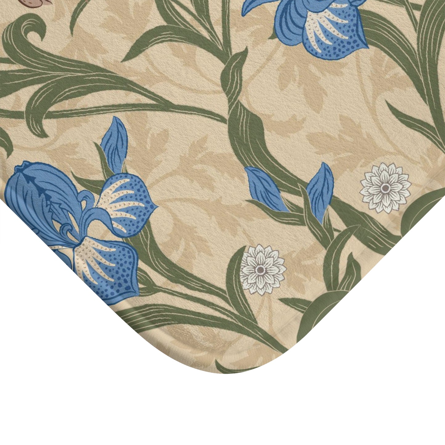 Microfibre bath mat with a floral pattern inspired by William Morris, predominantly blue irises on a beige background.