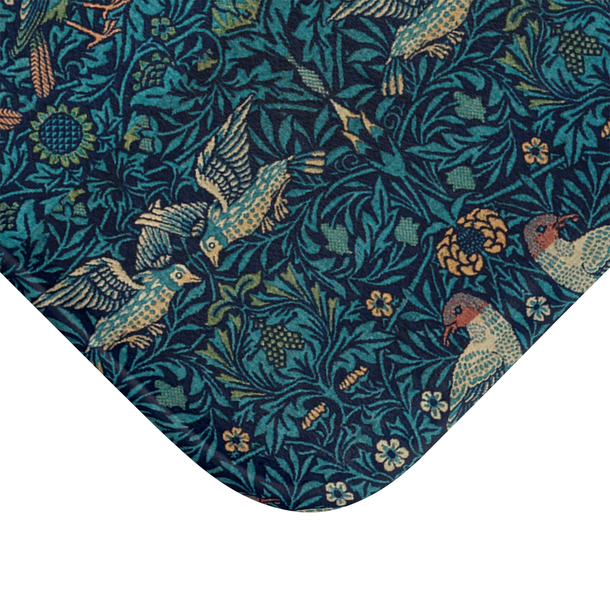Microfibre bath mat with a blue colour and a pattern inspired by William Morris, featuring birds and floral designs.
