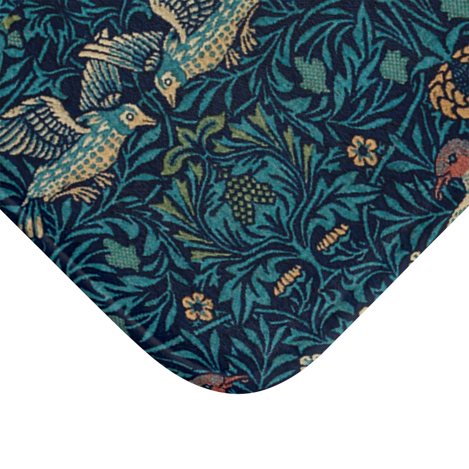 Microfibre bath mat with a blue colour and a pattern inspired by William Morris, featuring birds and floral designs.