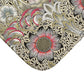 A rectangular microfibre bath mat with a floral pattern inspired by William Morris, predominantly in beige, green and pink colours.