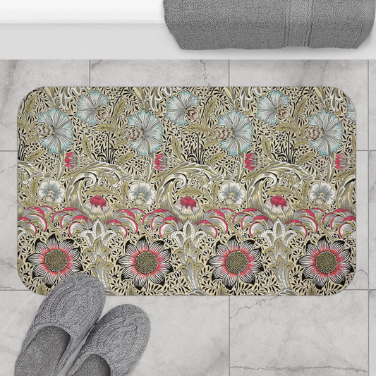 A rectangular microfibre bath mat with a floral pattern inspired by William Morris, predominantly in beige, green and pink colours.