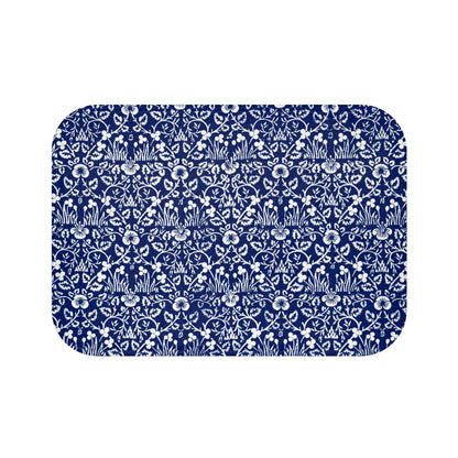 A rectangular microfibre bath mat with a blue floral pattern inspired by William Morris.