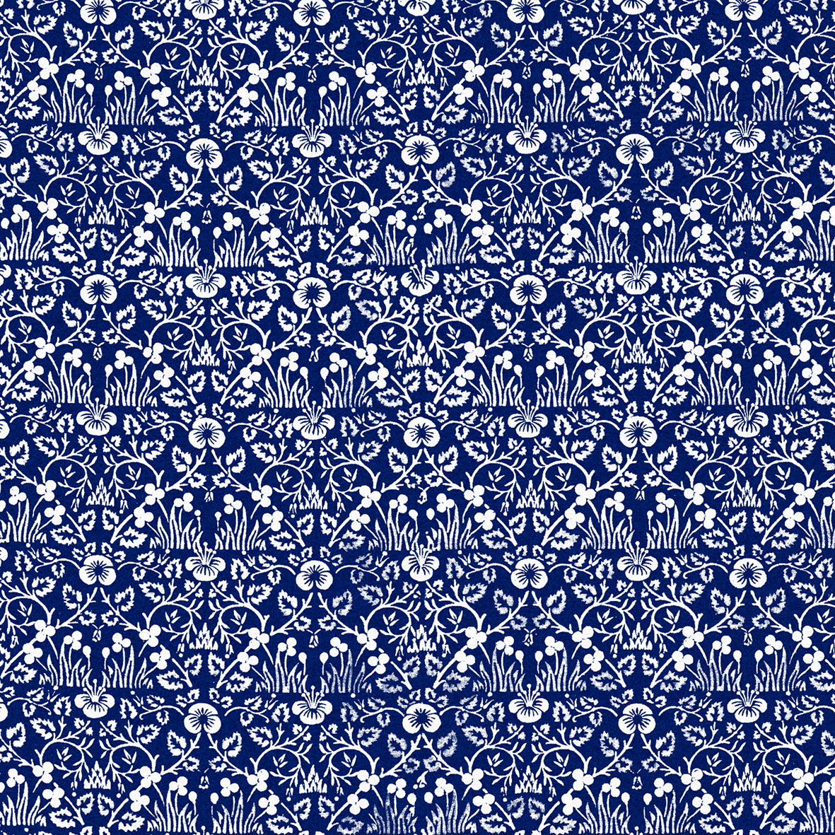 A rectangular microfibre bath mat with a blue floral pattern inspired by William Morris.