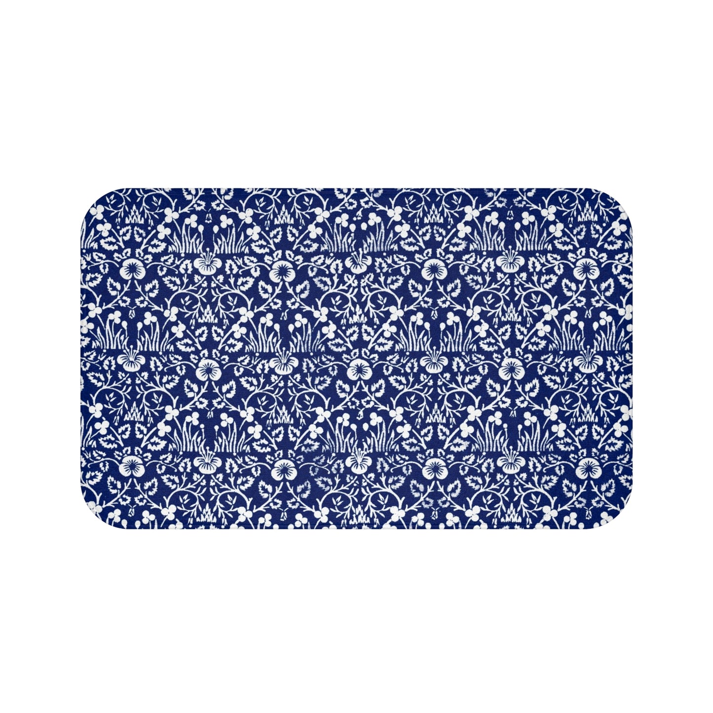 A rectangular microfibre bath mat with a blue floral pattern inspired by William Morris.