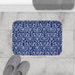 A rectangular microfibre bath mat with a blue floral pattern inspired by William Morris.