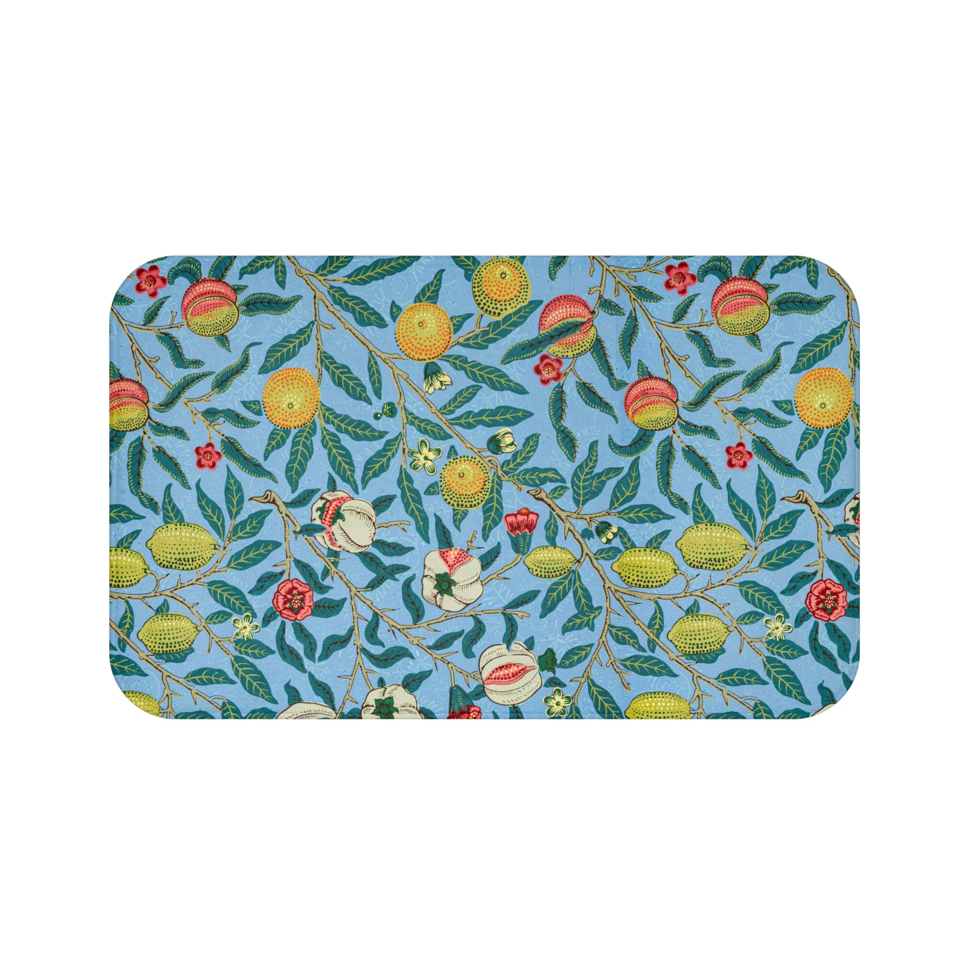 A rectangular microfibre bath mat with a floral pattern featuring fruits and leaves on a blue background.