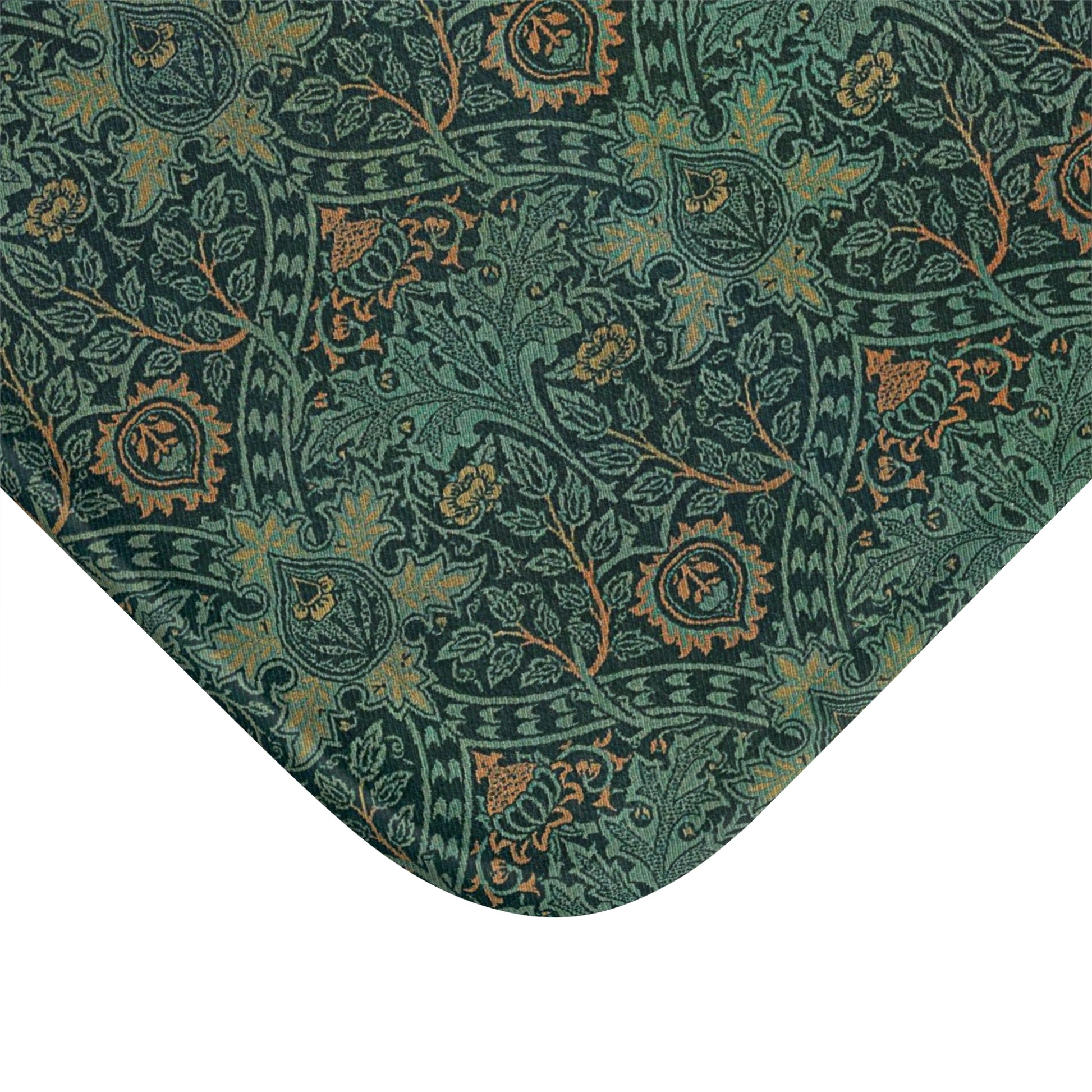 Rectangular microfibre bath mat with an intricate floral pattern in green and gold colours, with rounded edges and a non-slip black backing from William Morris.