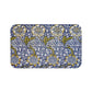 Floral patterned mat with blue and yellow design on a white background