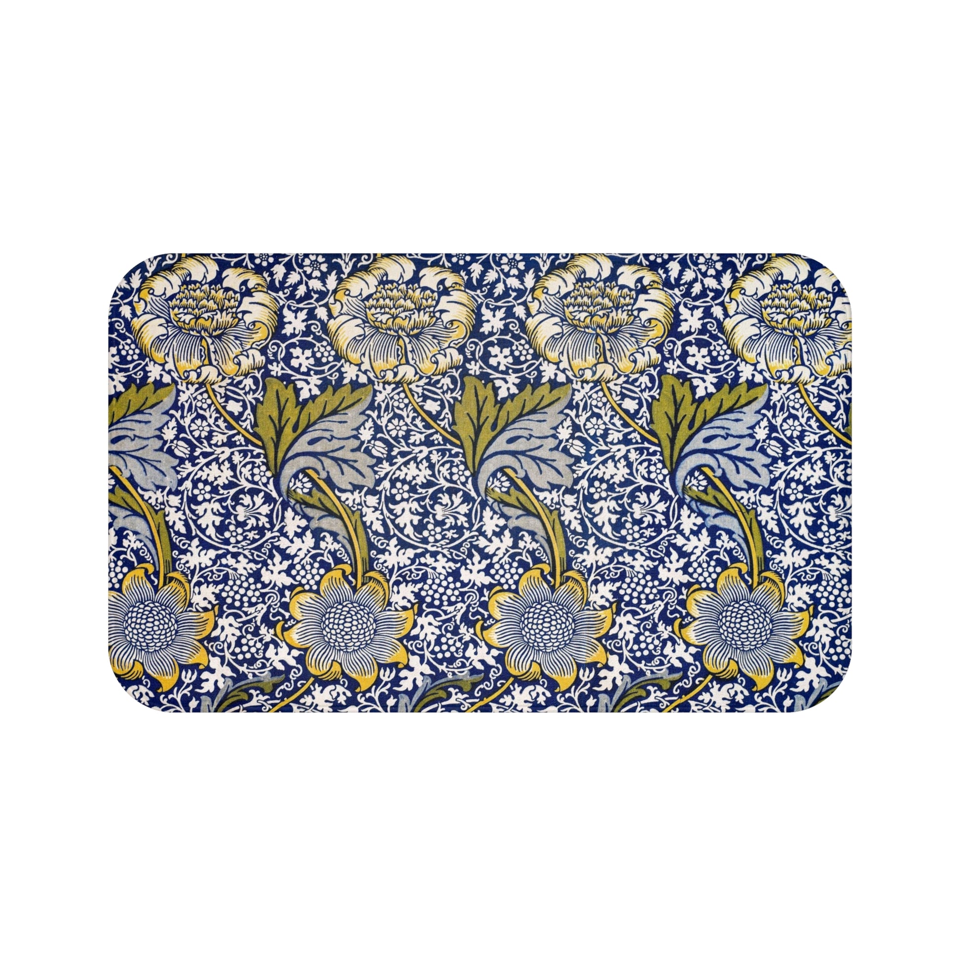 Floral patterned mat with blue and yellow design on a white background