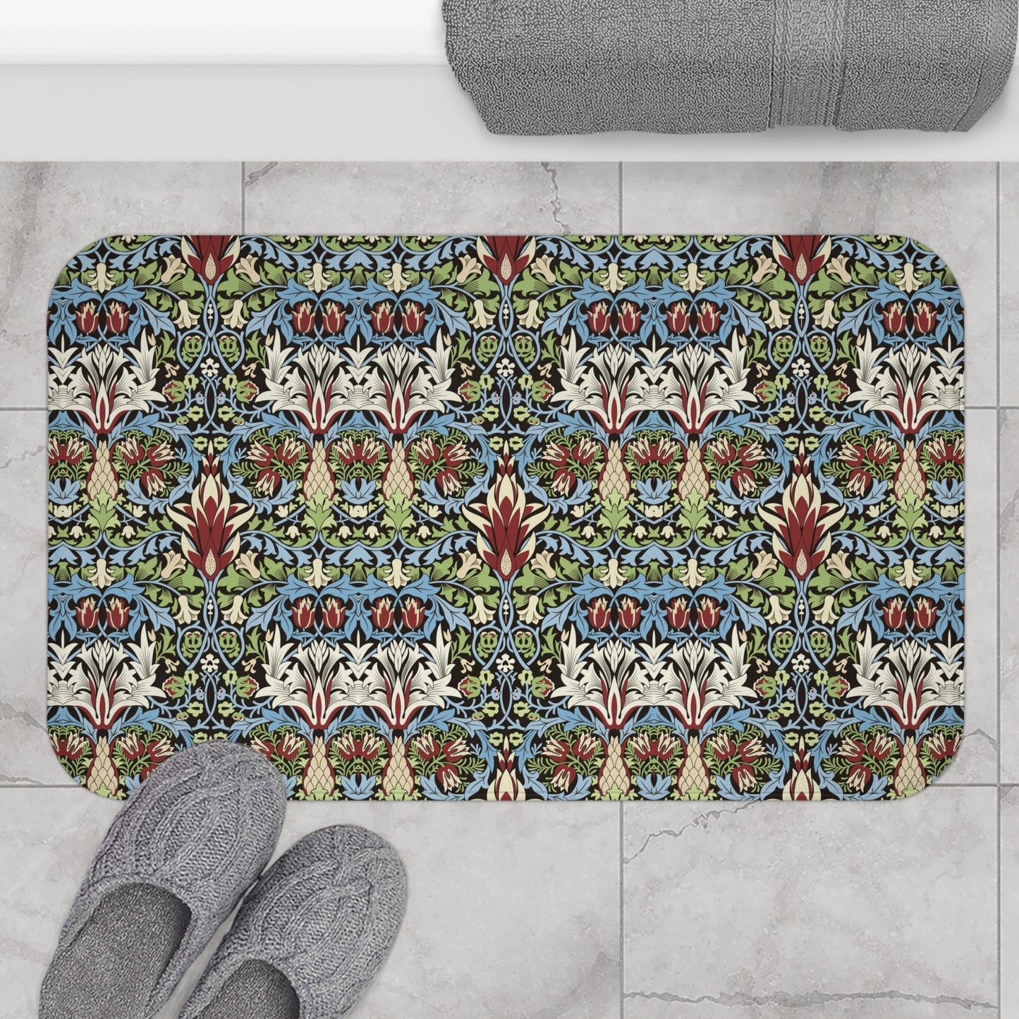 Decorative doormat with a colorful pattern on a tiled floor.