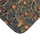 Decorative rug with nature-themed design featuring leaves, branches, and fruits.