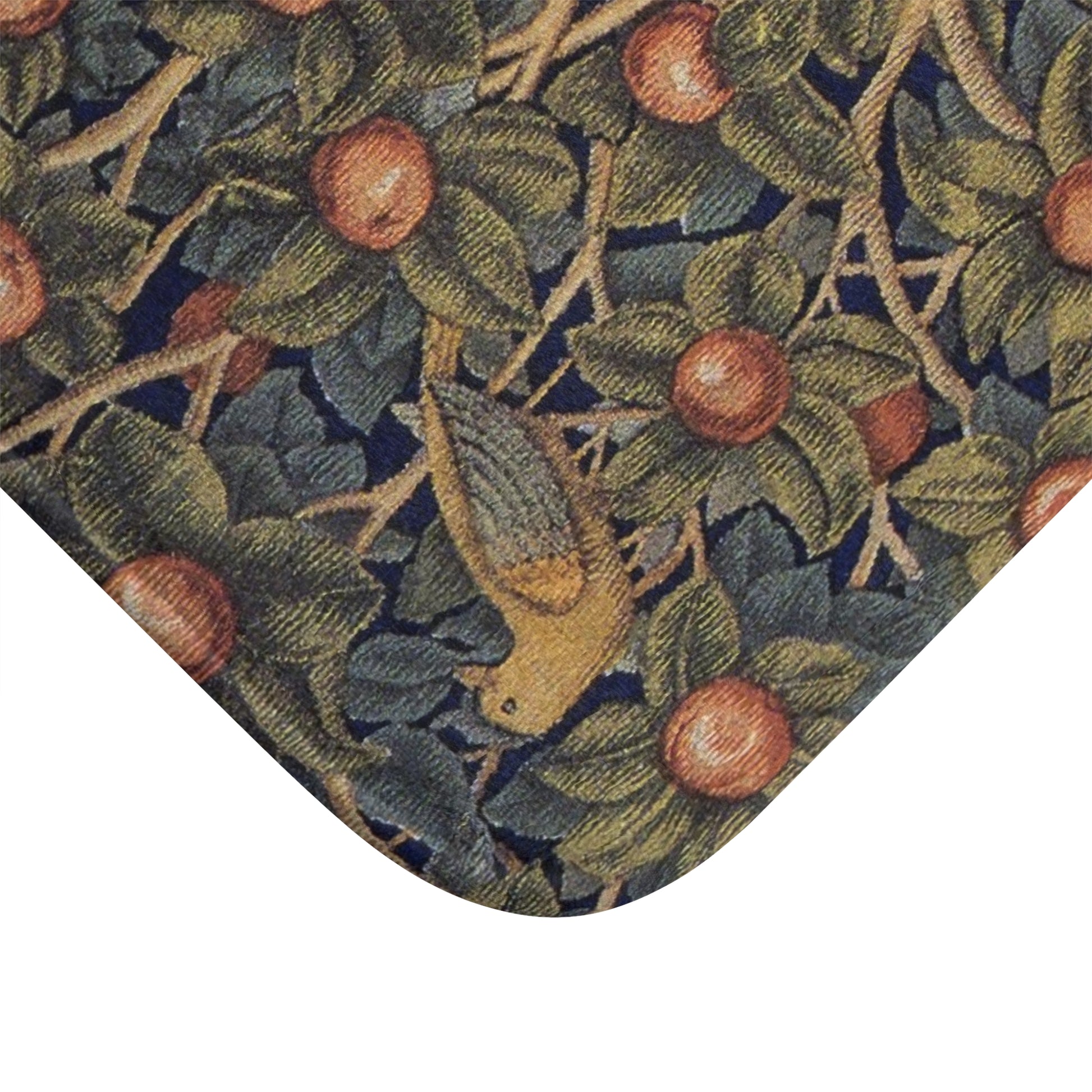 Decorative rug with nature-themed design featuring leaves, branches, and fruits.