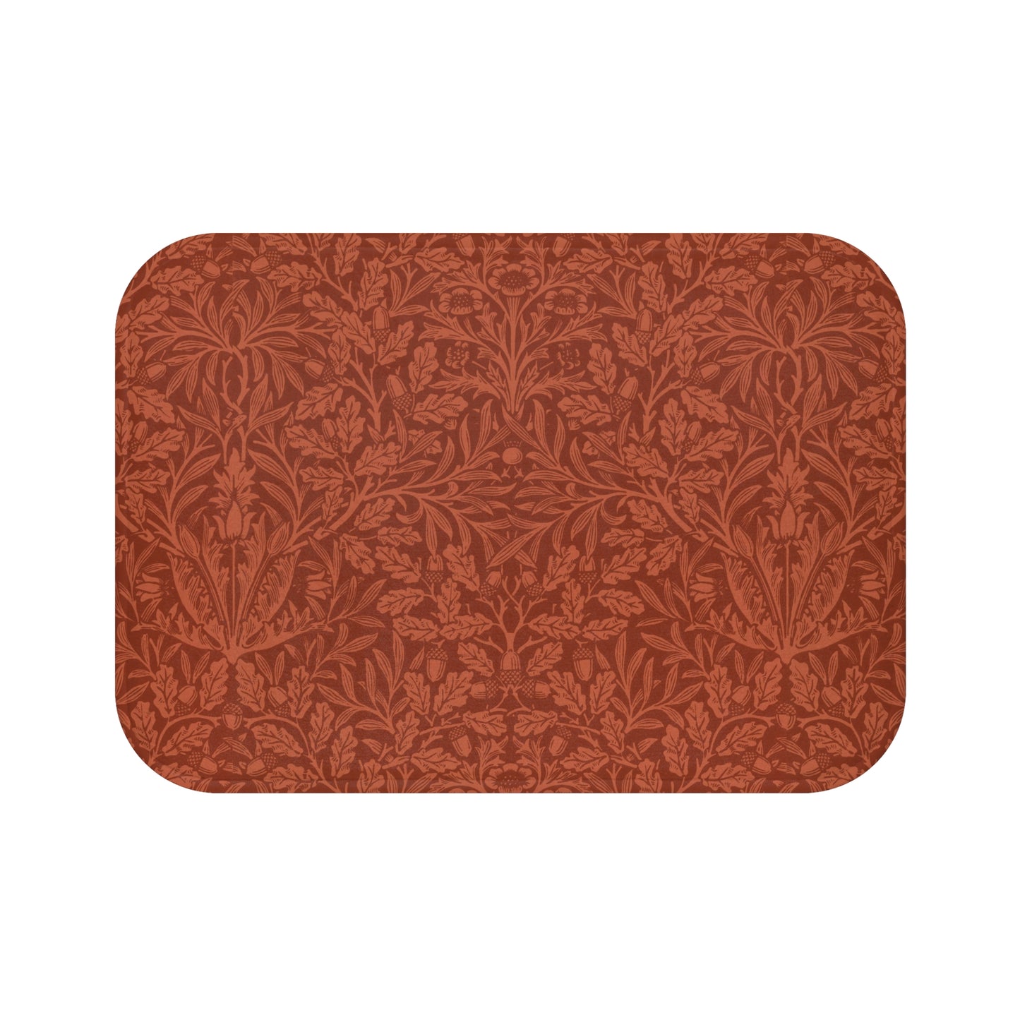 Rectangular microfibre bath mat in a rust colour with a floral pattern inspired by William Morris.