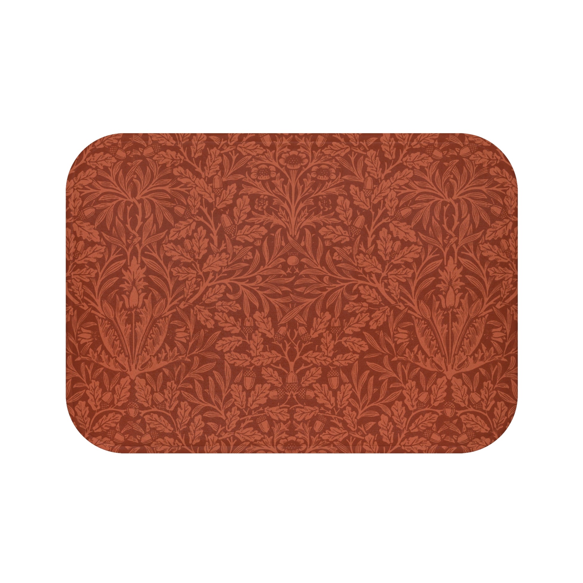 Rectangular microfibre bath mat in a rust colour with a floral pattern inspired by William Morris.