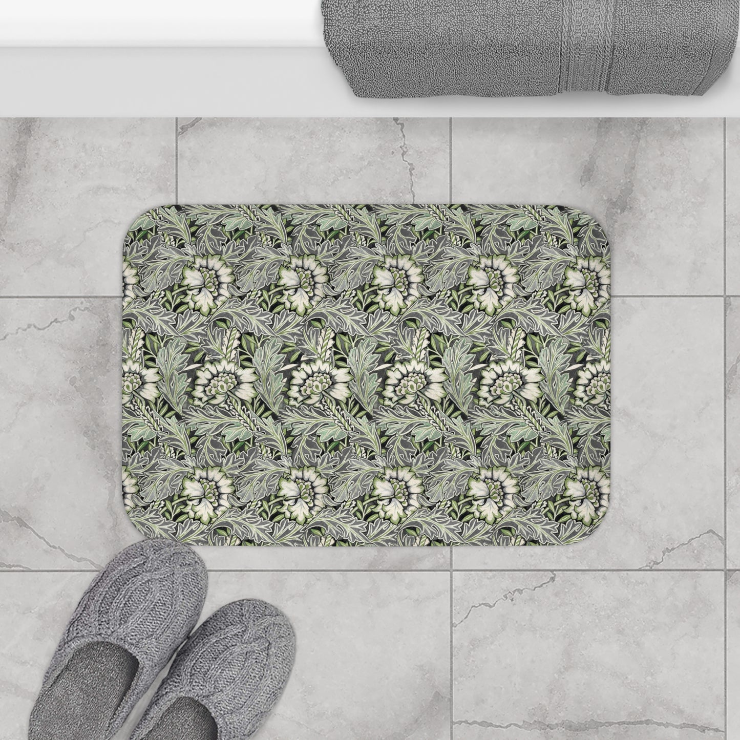 Microfibre bath mat with a floral pattern inspired by William Morris, predominantly grey in colour.