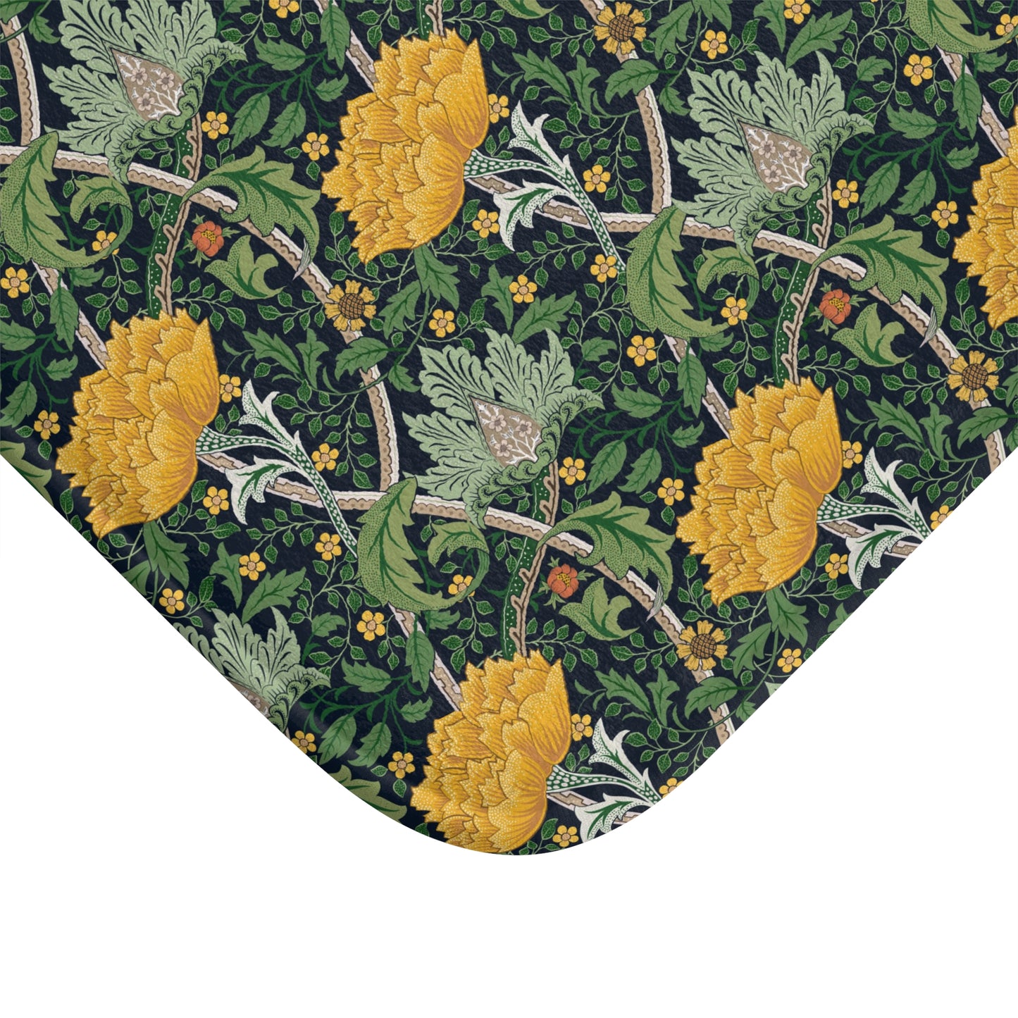 Microfibre bath mat with a floral pattern inspired by William Morris, predominantly yellow flowers on a green background with a non-slip border.