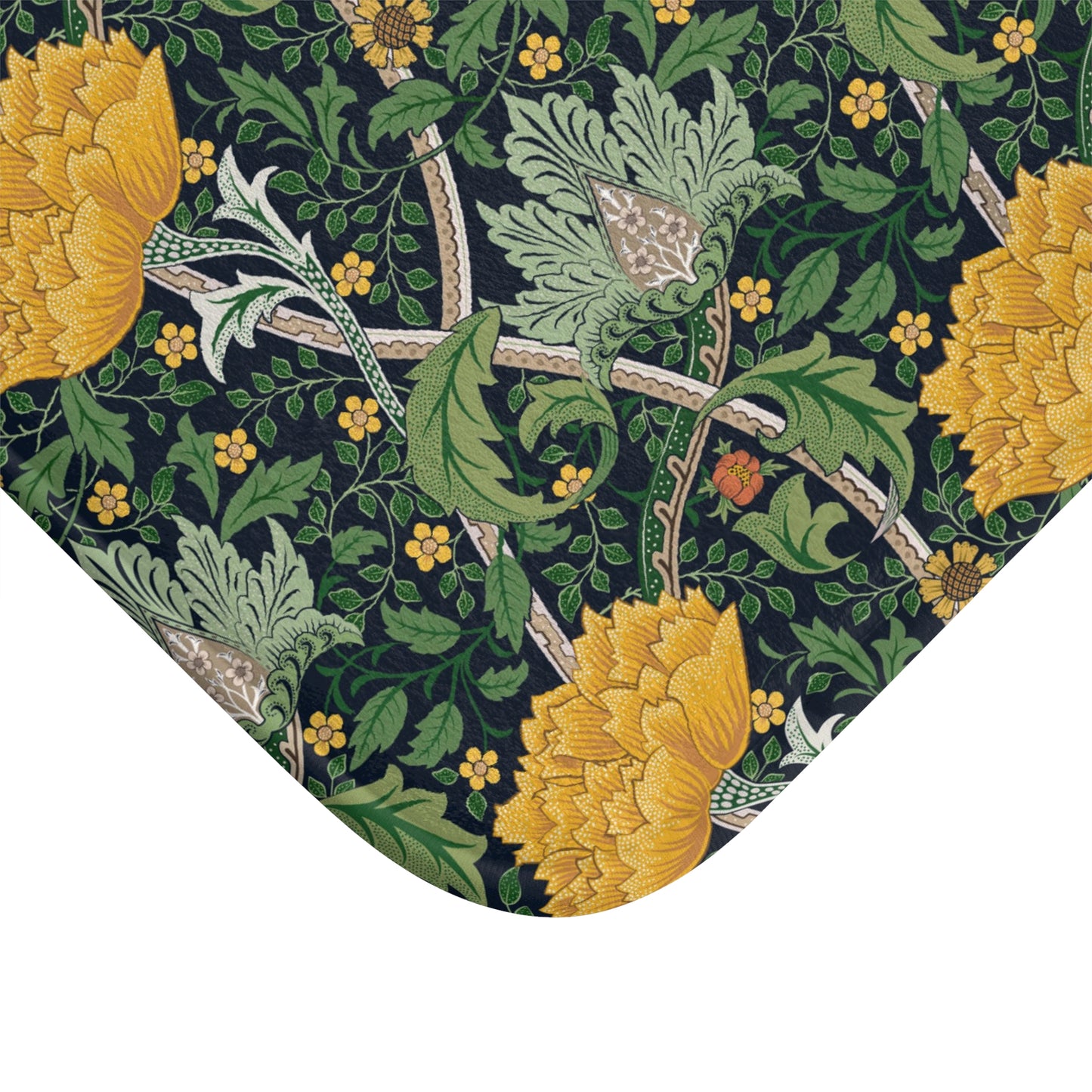 Microfibre bath mat with a floral pattern inspired by William Morris, predominantly yellow flowers on a green background with a non-slip border.