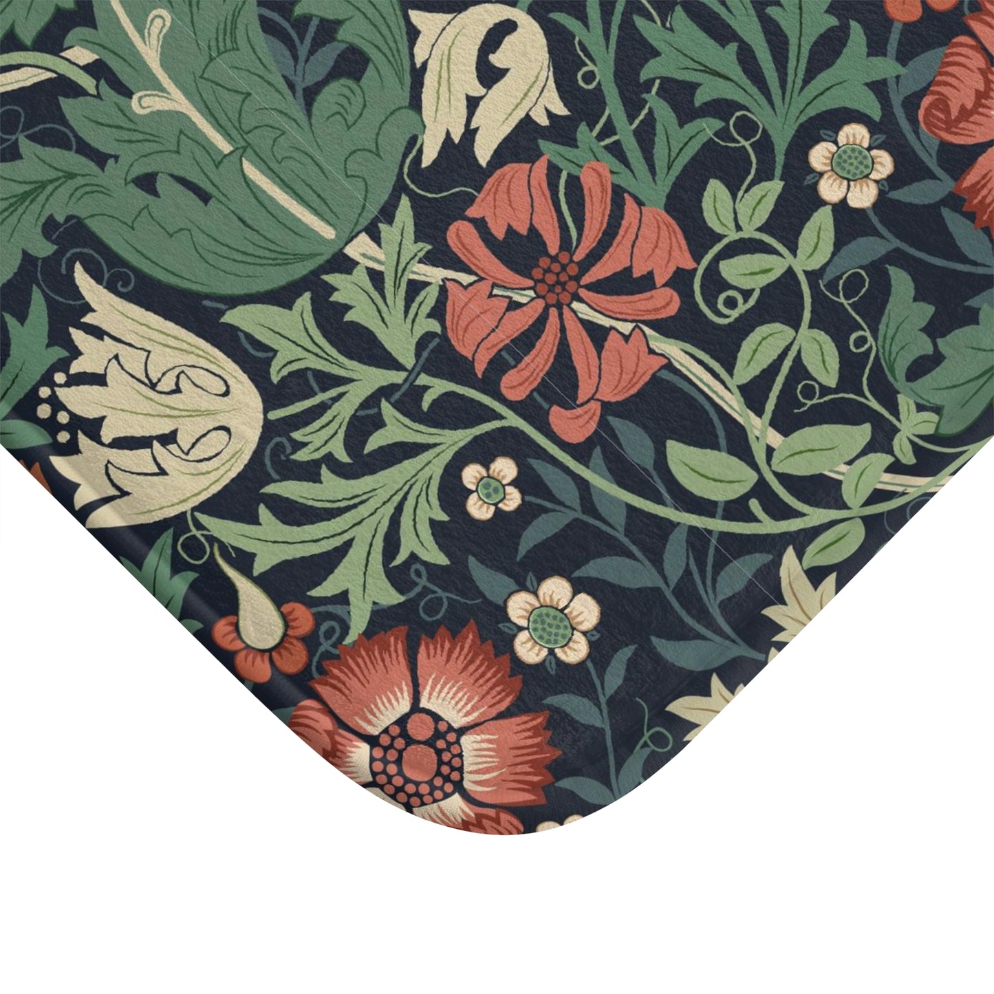 Rectangular microfibre bath mat with a floral pattern inspired by William Morris, in colours green, red, and beige.