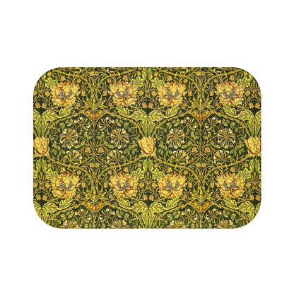 A round microfibre bath mat with a floral pattern in gold, brown, and green colors, inspired by William Morris - Honeysuckle Collection.