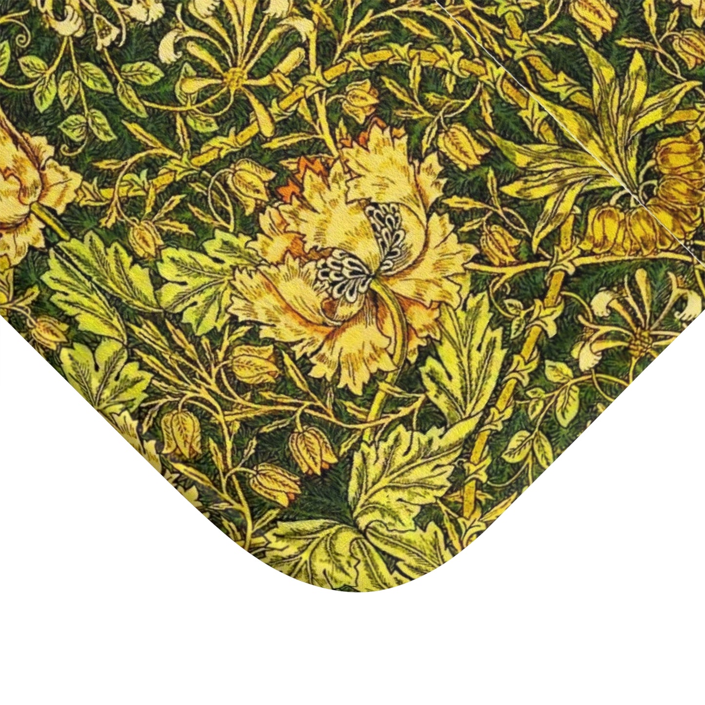 A round microfibre bath mat with a floral pattern in gold, brown, and green colours, inspired by William Morris - Honeysuckle Collection.