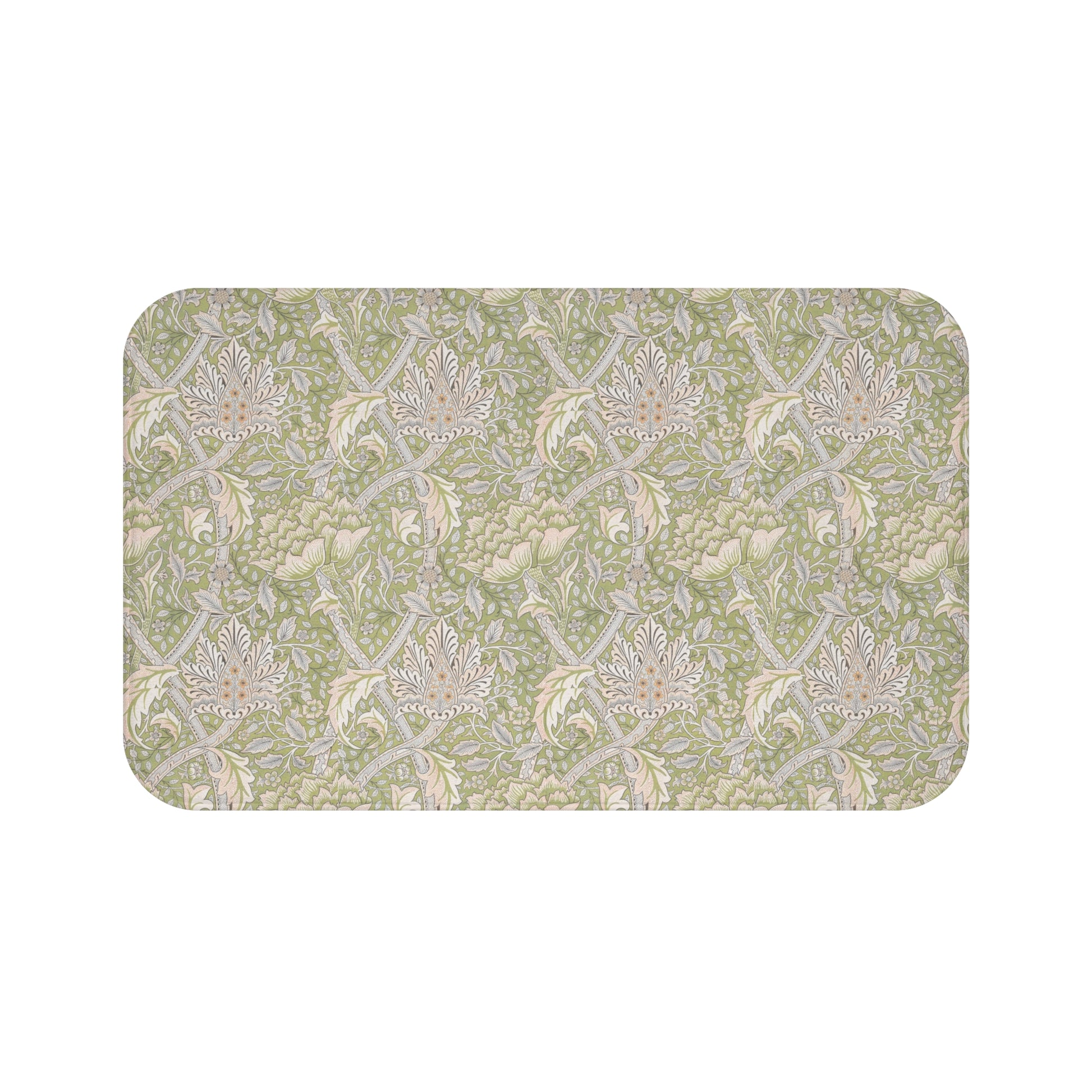 Patterned green and beige rug on a white background