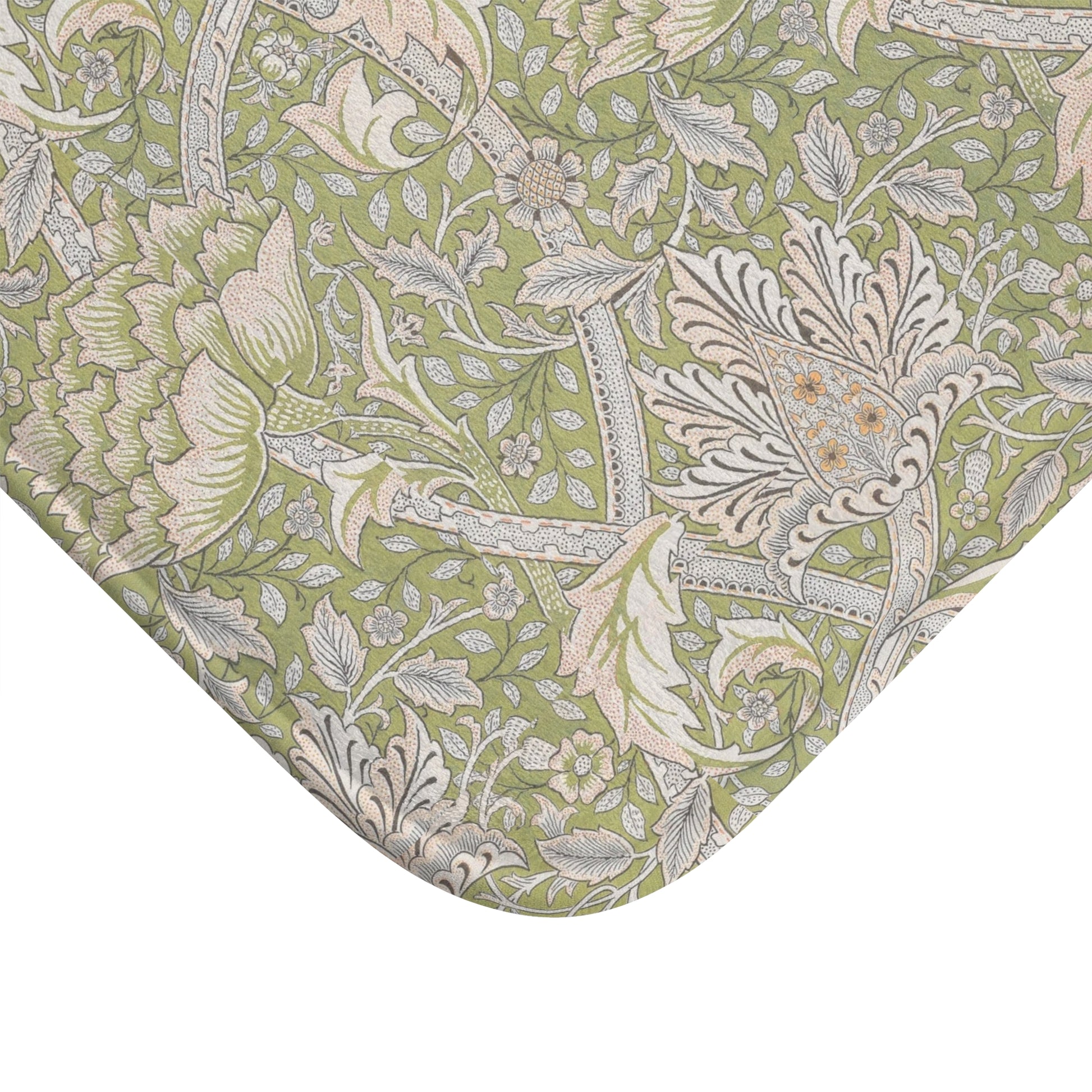 Close-up of a floral patterned fabric with green background